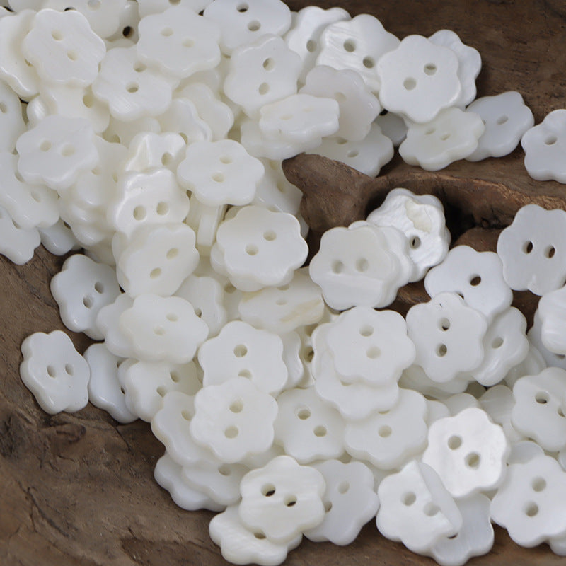 Assorted flower 2-hole pearl shell buttons, white, rounded scalloped shape
