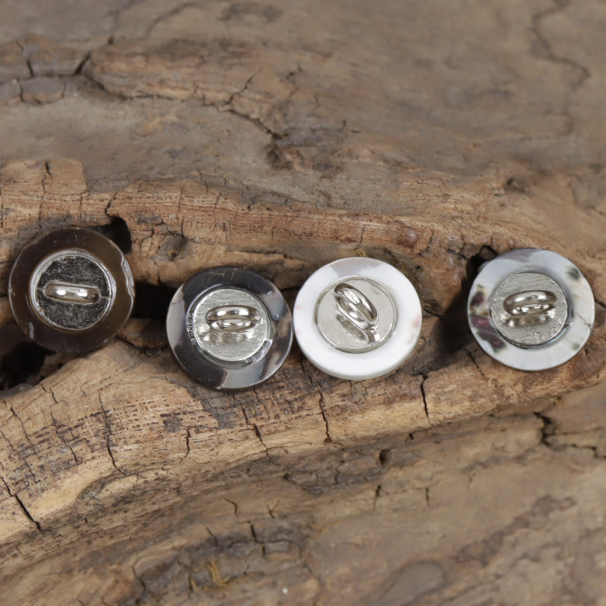 Natural shell shirt buttons with silver shanks: dark, gray, white, black