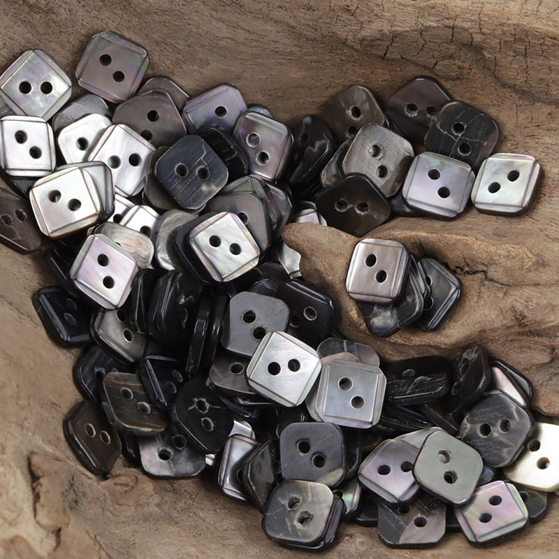 Irregular rhombus shell buttons assortment, mostly dark and silver-tone, 2/4 holes
