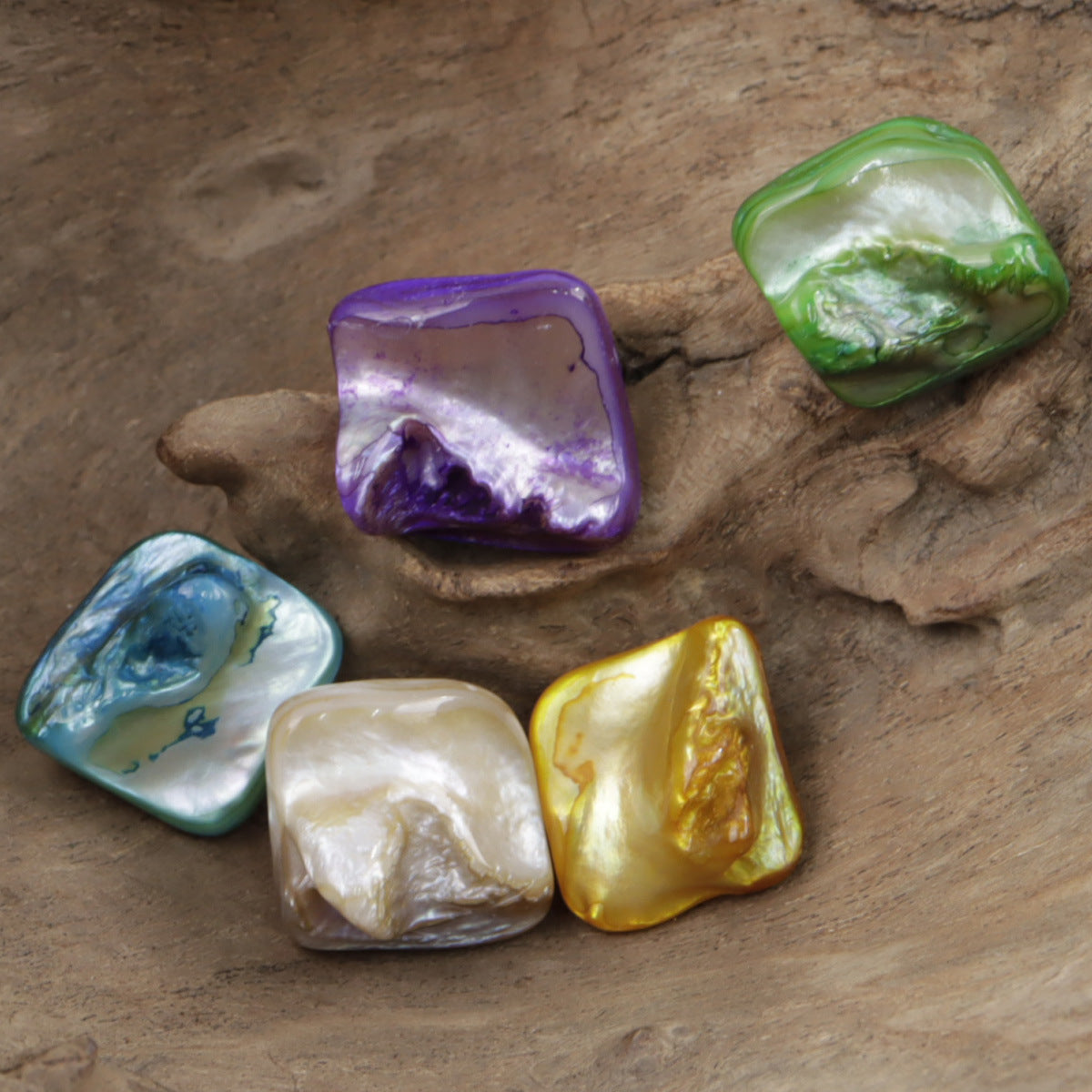 Square shell buttons with metal shanks: purple, green, blue, natural, gold