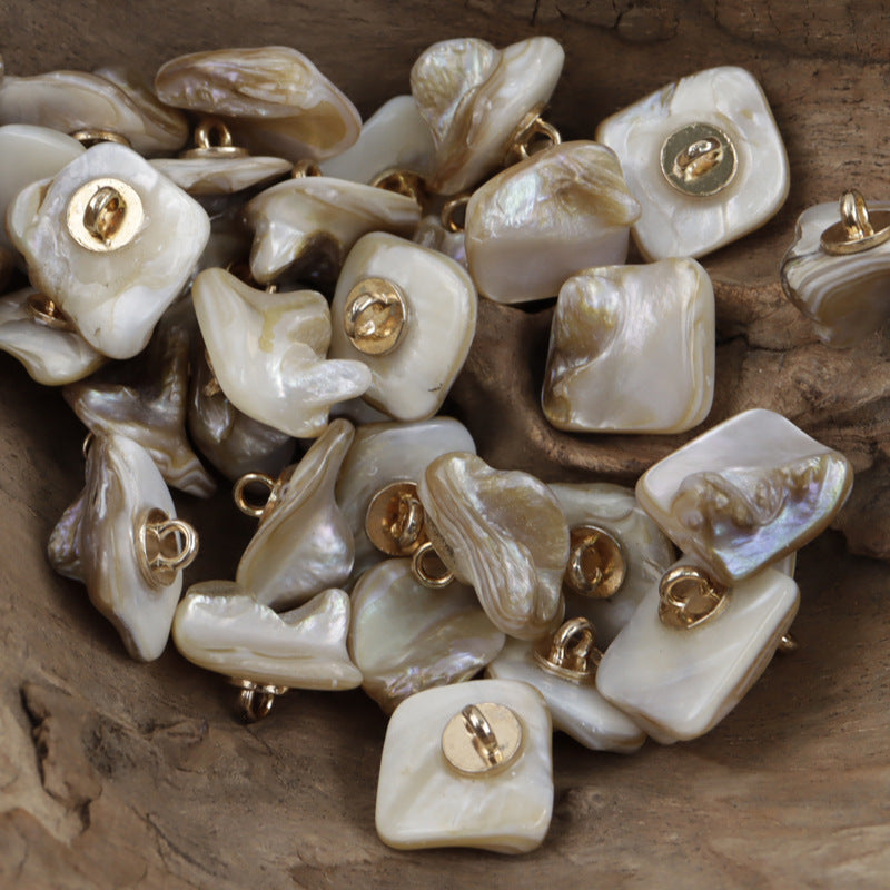 Natural shell shank buttons, square shape, with gold-toned metal loops