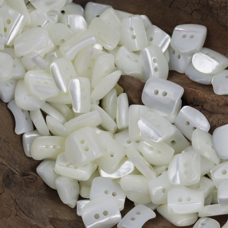 Mixed irregular oval shirt buttons, creamy white, 2-hole design (10 pcs)