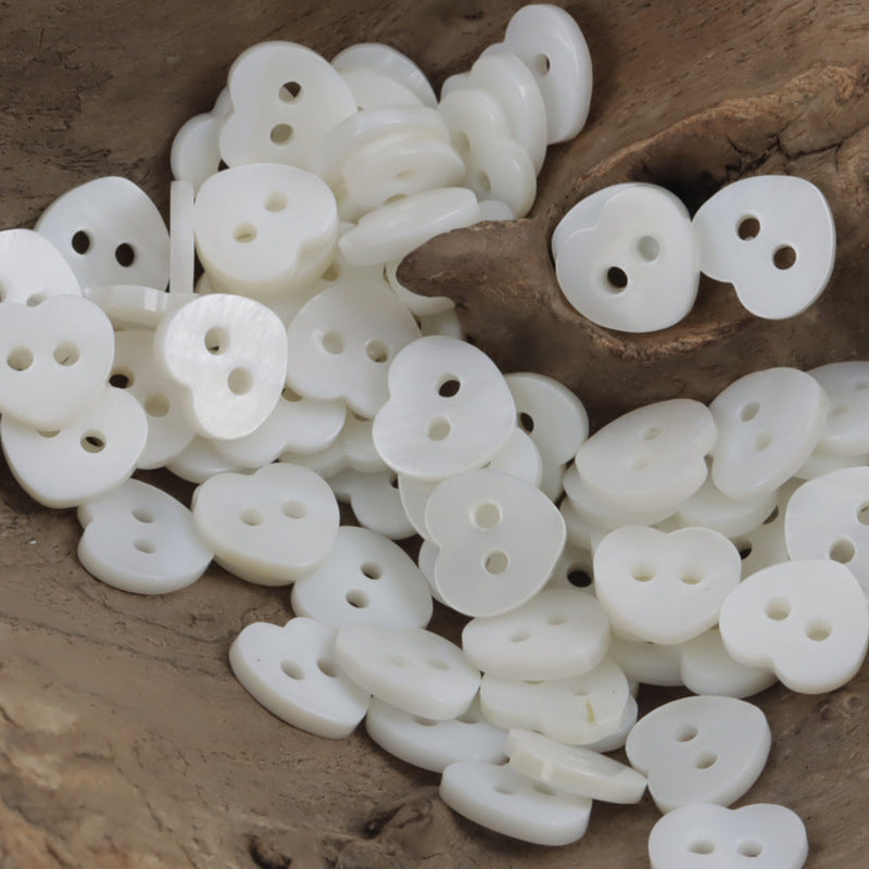 Natural shell heart-shaped buttons, white, two holes (10 pcs)