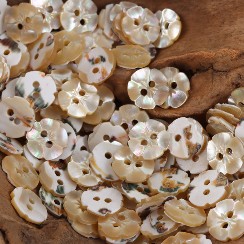 Petal-shaped shell buttons with 2 holes, beige/cream mix