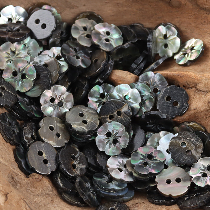 Petal-shaped 2-hole shell buttons, dark/black iridescent lot