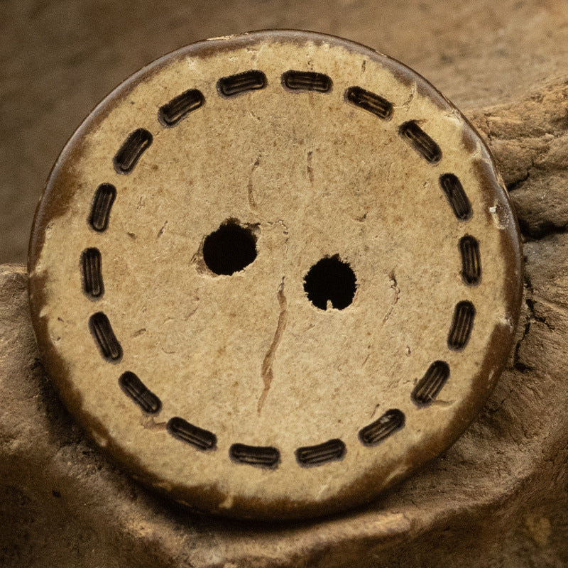 Round two-hole coconut shell button, tan, dark dotted rim, Style A