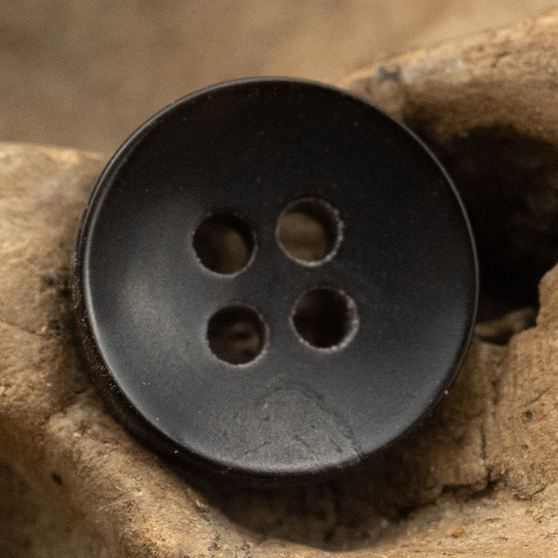 Black 4-hole bowl shirt button, close-up front, 10 pcs