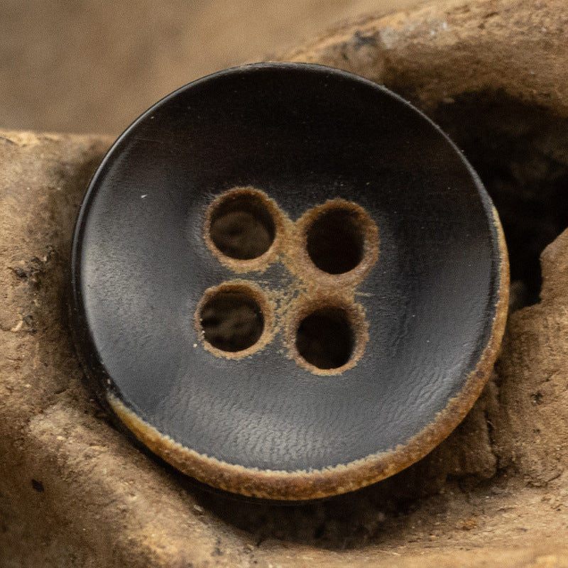 Burnt black 4-hole bowl shirt button, close-up front, 10 pcs