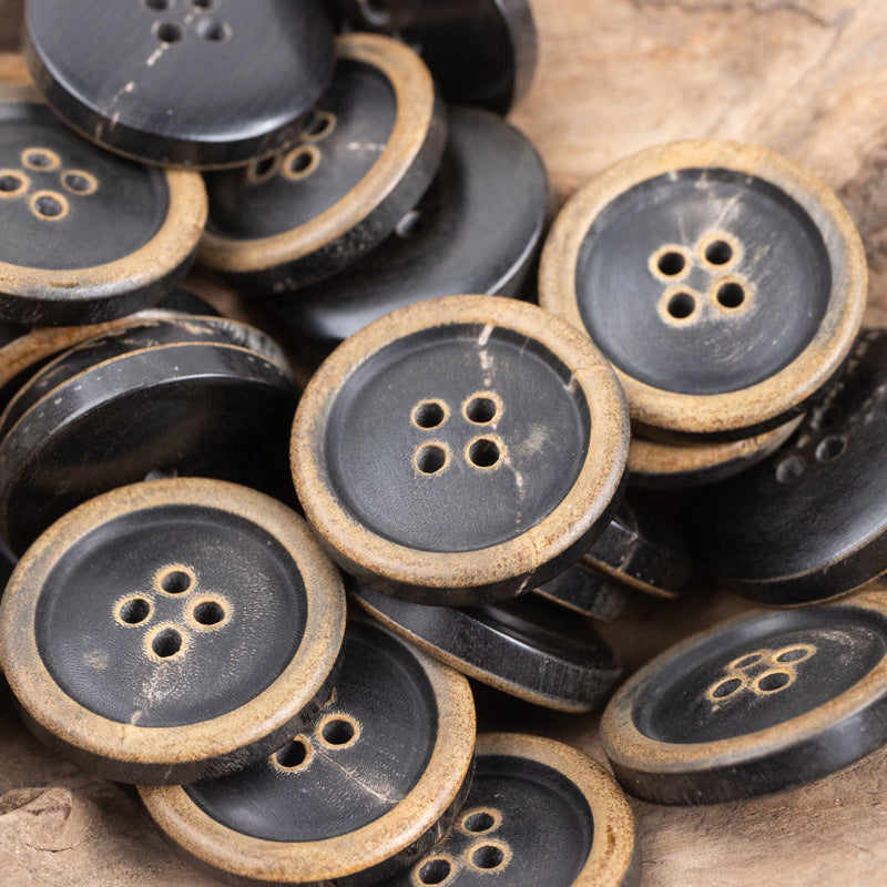 Assorted dark horn buttons for wool suits, tan border and four holes