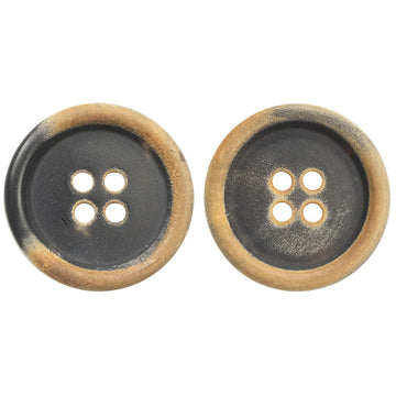 Black horn button with cross-shaped 4-hole design and light burnt rim