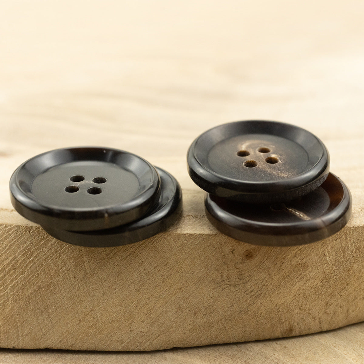 15–25mm vintage horn button, coffee brown/gray 4-hole design (pair shown)