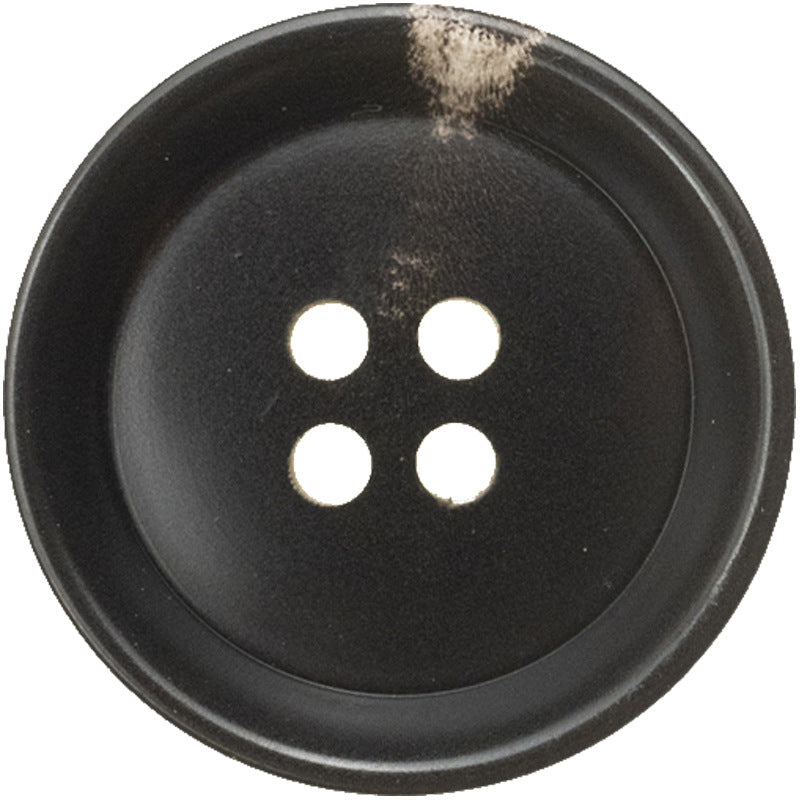 Black pan-shaped 4-hole button, close-up front view