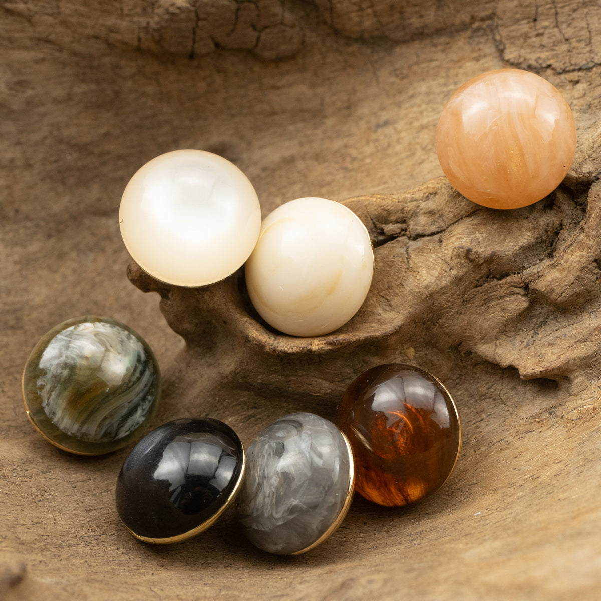 Round cheongsam buttons with gold shanks in white, peach, gray marble, amber and black