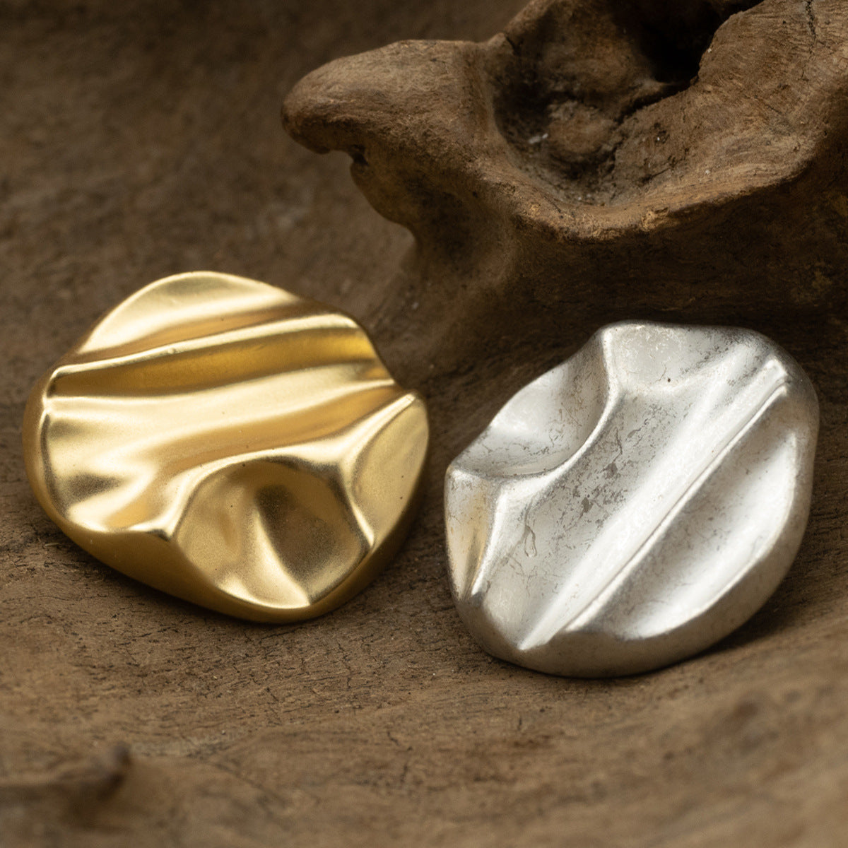 Matte geometric metal shank buttons, gold and silver, rounded with diagonal channel lines