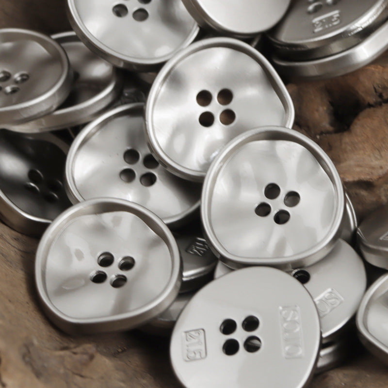 White nickel four-hole metal triangle buttons, round faces with 4 eyelets