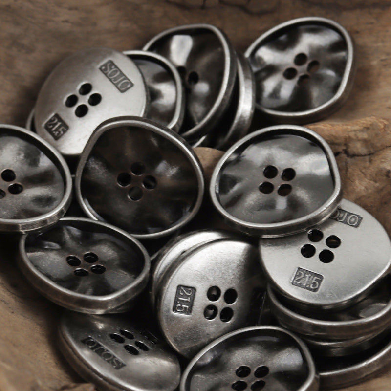 Dark silver four-hole metal triangle buttons, round faces with 4 eyelets