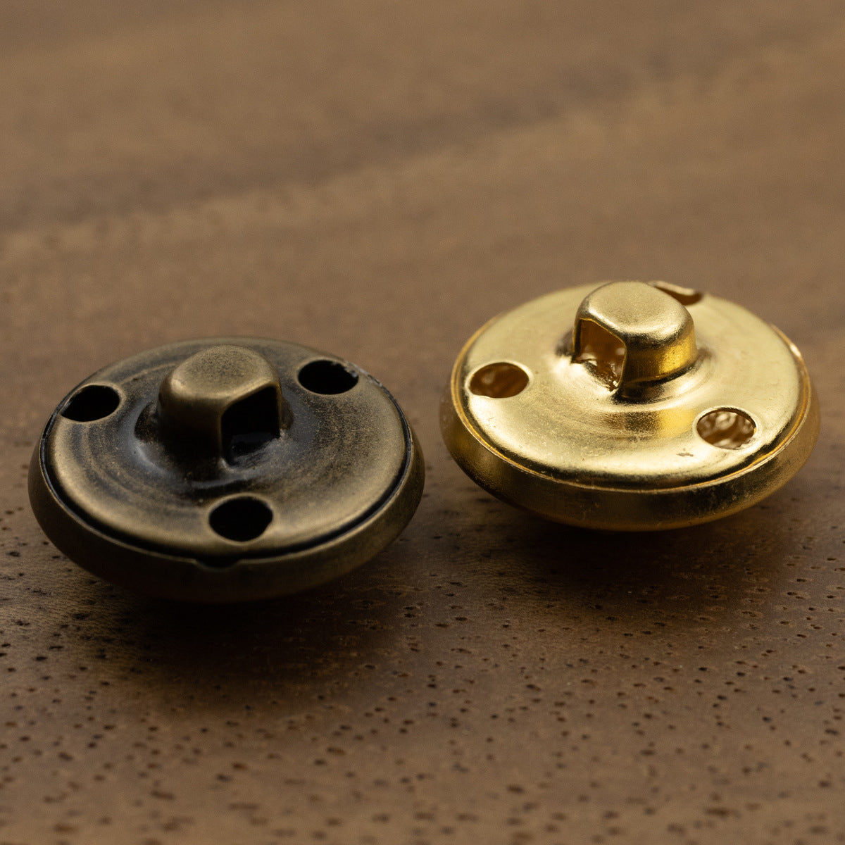 Dragon metal shank button back: dark antique bronze and gold, with attachment holes