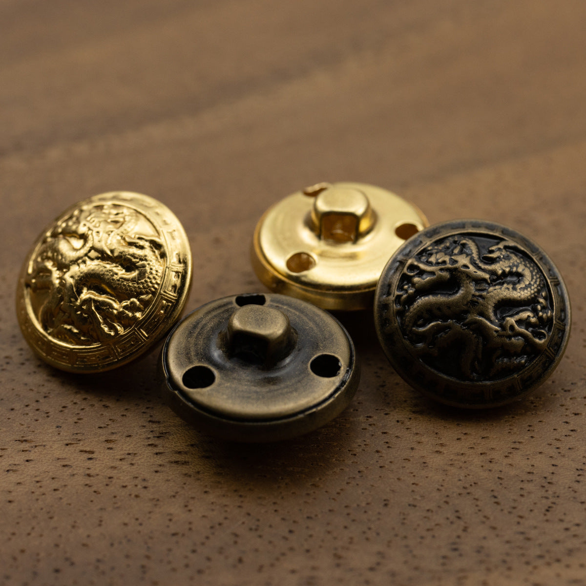 Dragon shank button backs with four-hole base, gold and antique bronze tones