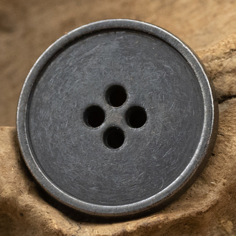 Round 4-hole metal button, gun black finish with four dark holes