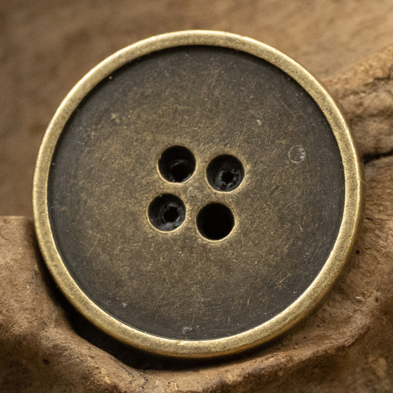 Round 4-hole metal button, antique bronze finish with four dark holes