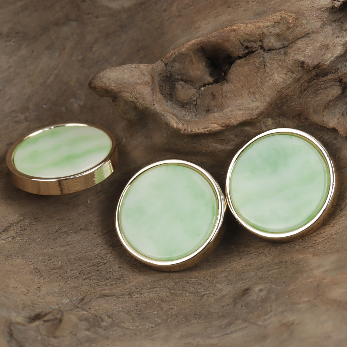 Jade green resin buttons, round gold-tone backs with glossy green centers