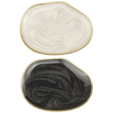 Irregular oval pearl glassy metal buttons: white and black, shiny gold rim.
