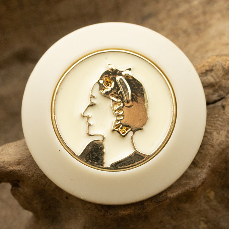 Beige retro portrait resin button with gold profile portrait design and metal shank