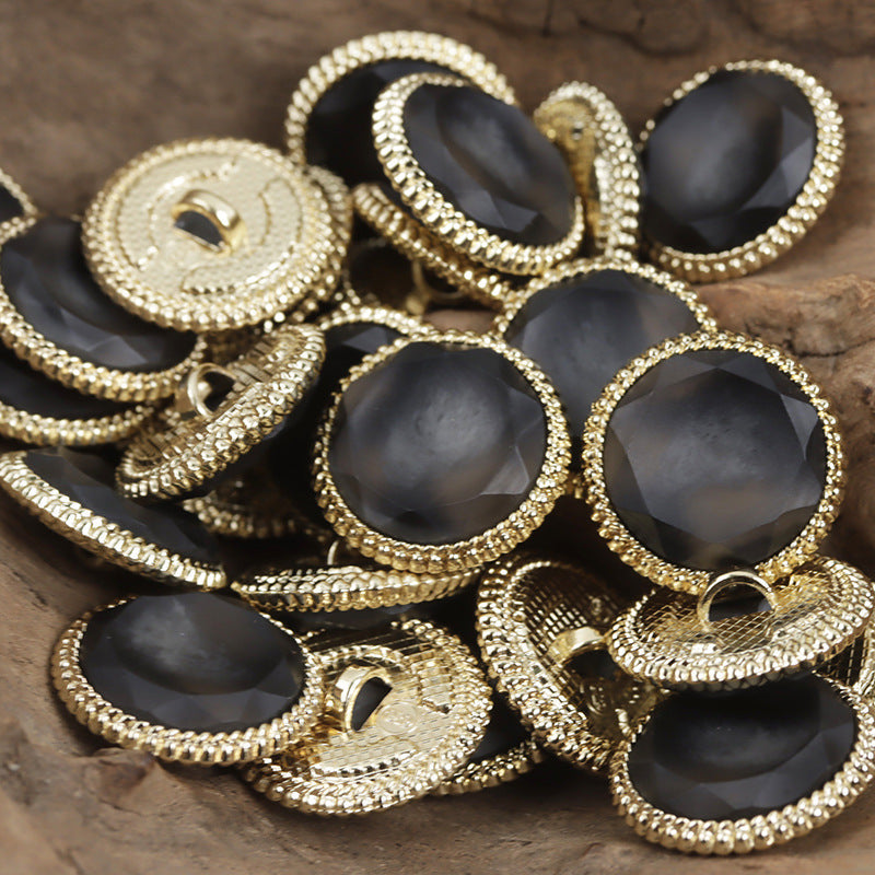 Black resin buttons with gold beaded edge and metal loop on backs, 18–23mm