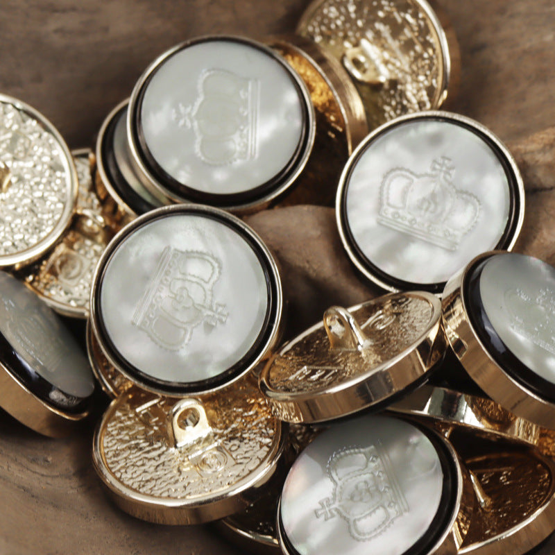 White resin crown pattern buttons with gold metal bases, round embossed crown