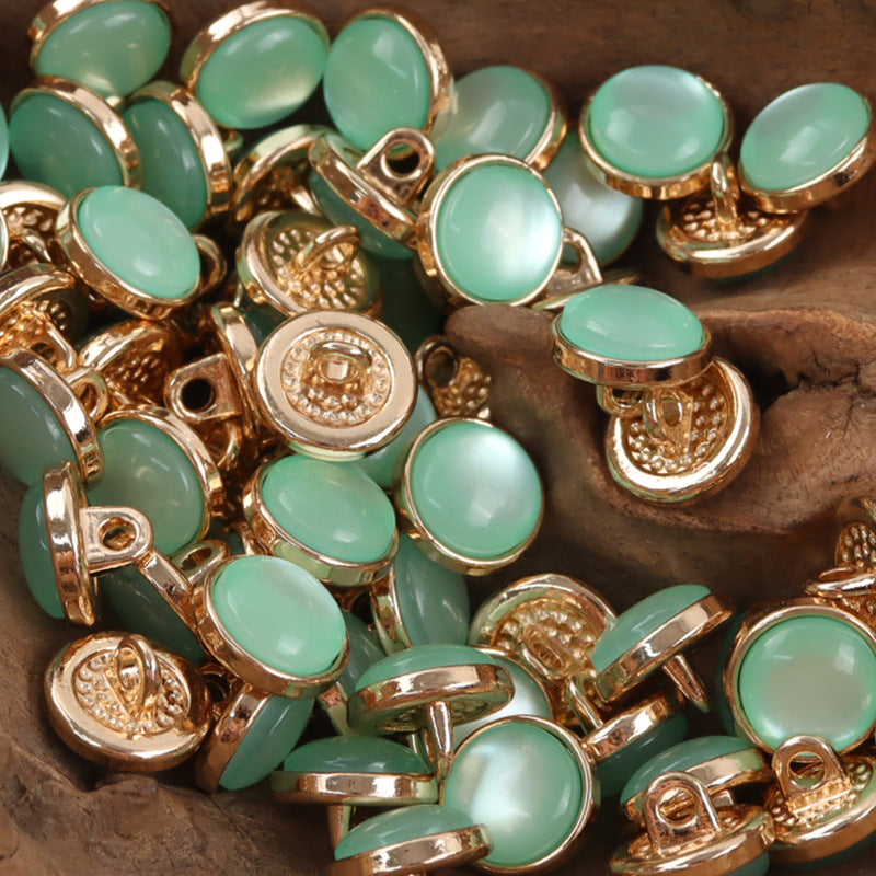 12.5mm mint green resin buttons with gold-tone loop shanks, round, textured backs