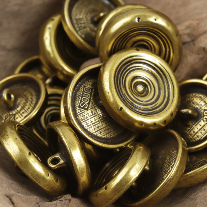 Antique bronze metal shank buttons with bowl-shaped spiral faces, assorted set