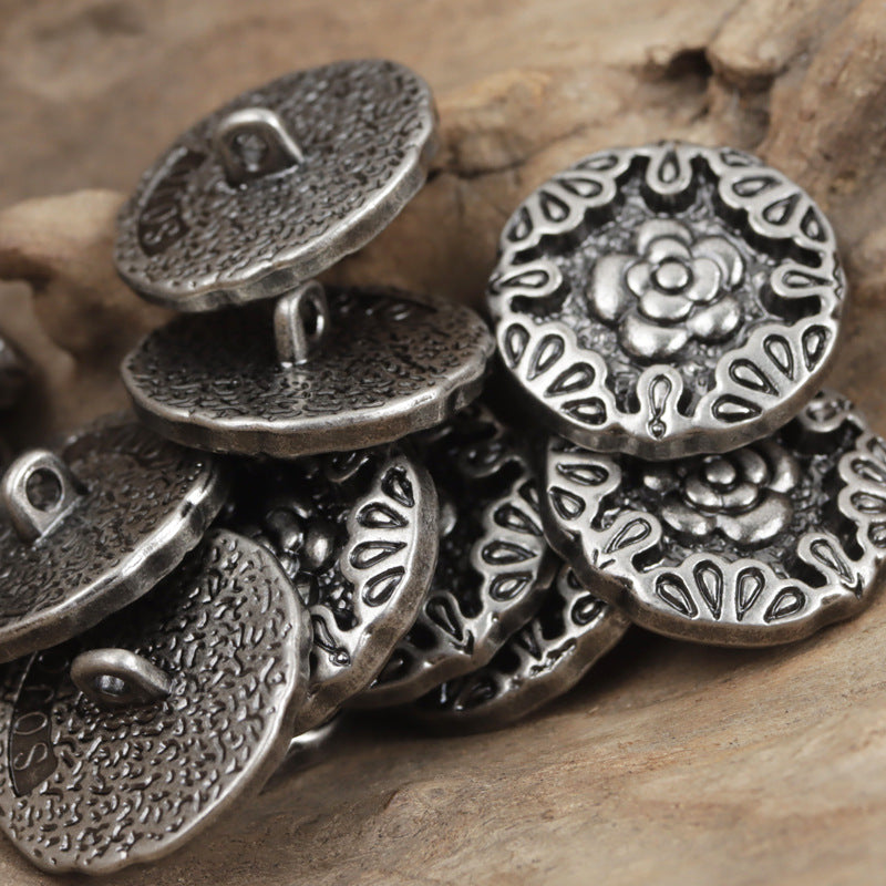 Nickel black embossed rose metal shank buttons, floral face with shanks visible