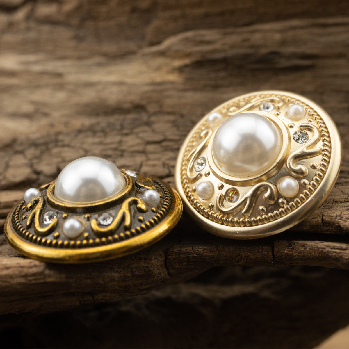Gold decorative shank button, domed pearl center with rhinestones and ornate swirl border