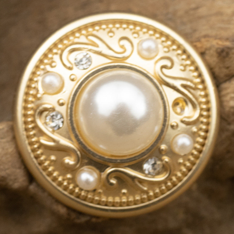 Misty gold pearl-and-rhinestone button, round filigree frame with domed pearl center