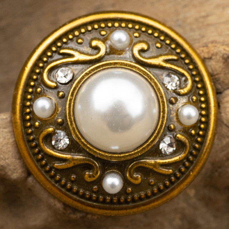 Dark gold round button with domed pearl center, rhinestones, and small pearl details