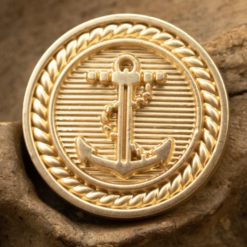Gold nautical anchor metal button, round design with braided edge