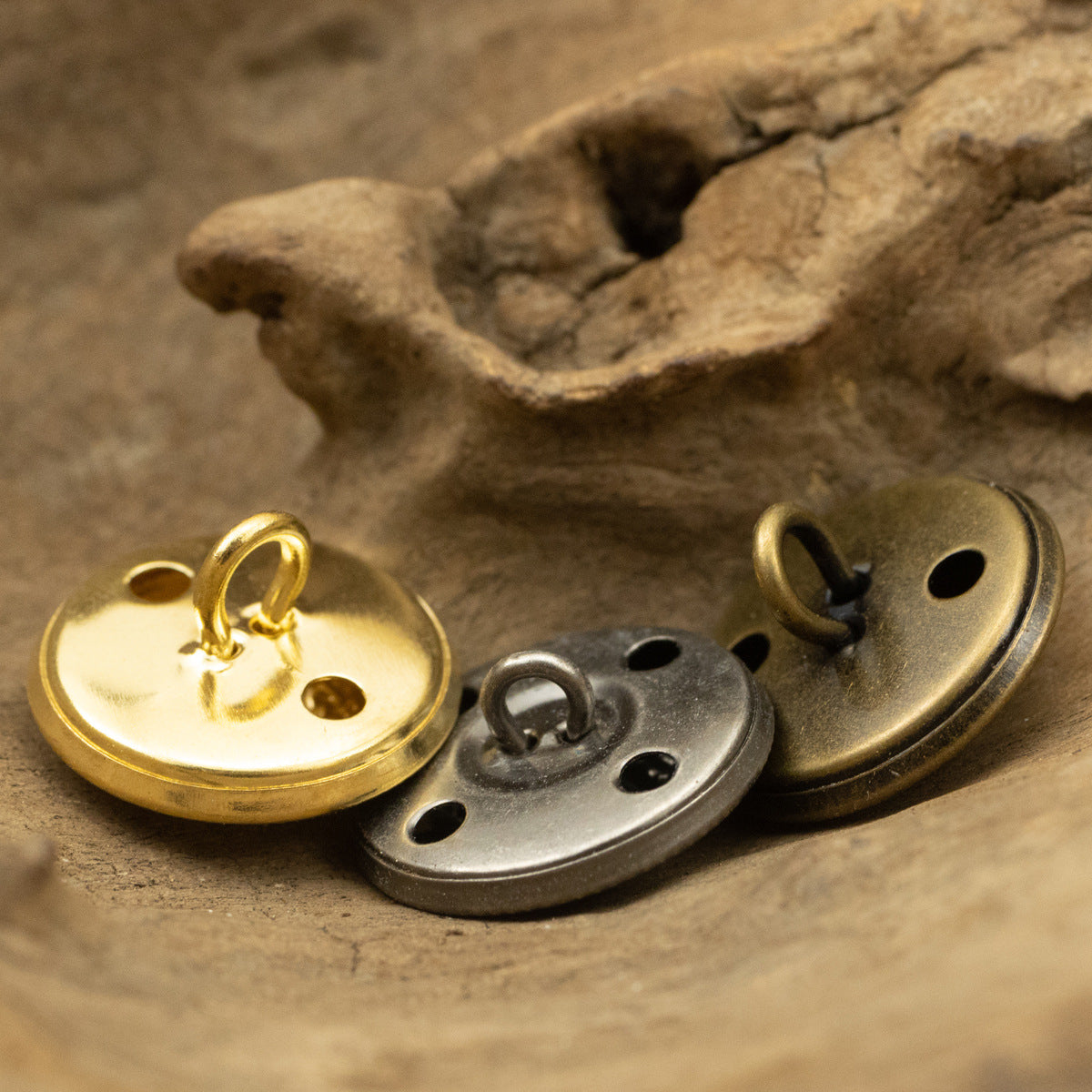 Crown crest metal shank button backs with sewing holes, gold, bronze, and silver