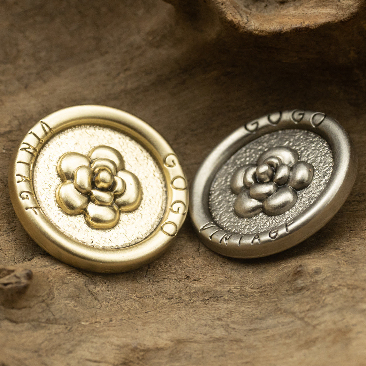 Rose-pattern antique metal shank buttons—gold and silver front with curved detail