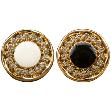 Gold metal rhinestone-dotted jacket buttons, white and black centers