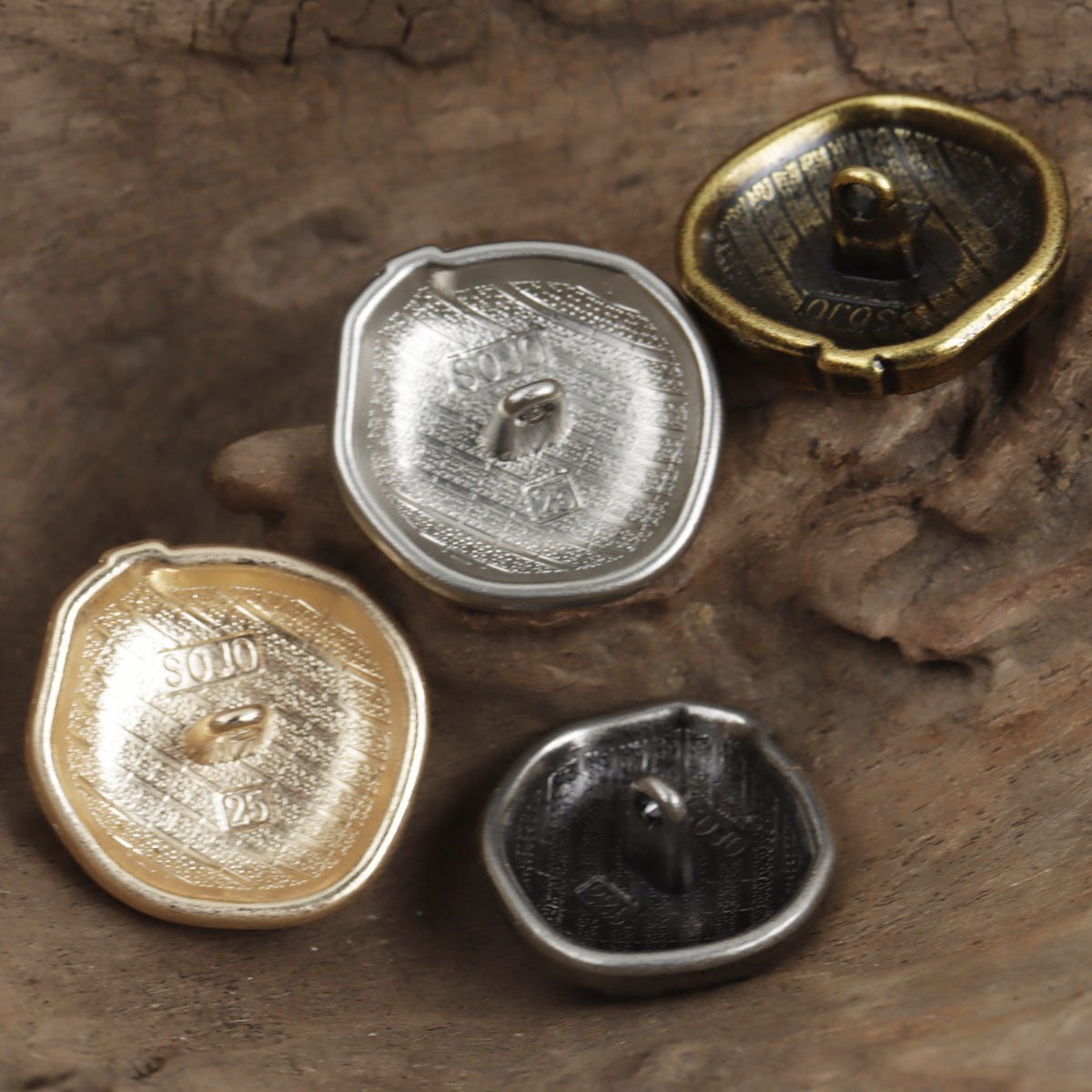 Metal buttons with woven pattern and loop shank, fronts in silver, gold and dark