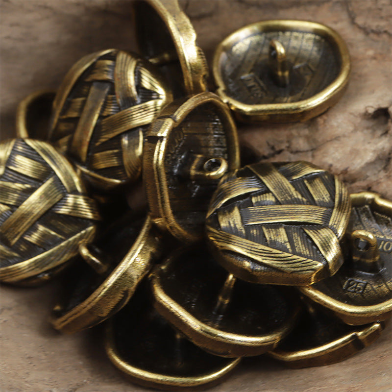 Bronze-gold and dark metal buttons with irregular woven pattern and shank, round