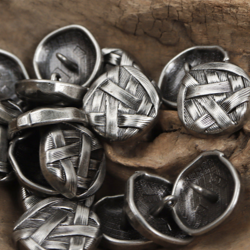 Nickel black metal buttons with irregular woven pattern and shank, round