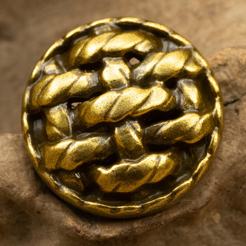 Gold twisted braided metal button, reflective round hammered surface