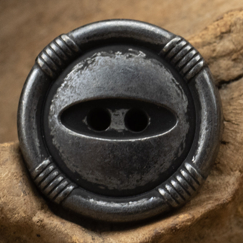 Black nickel cat’s eye metal button with ridged edge and 2-hole shank