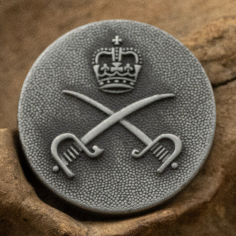 Sword hunting metal button, crown above crossed swords in black nickel tone
