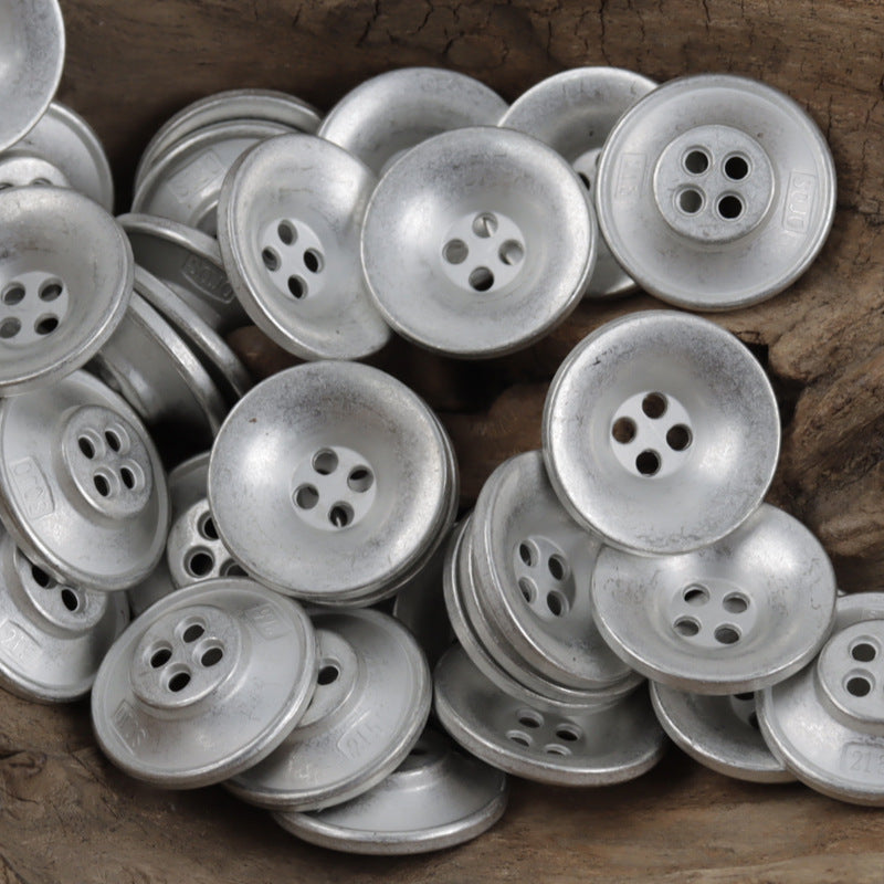 Round bowl-shaped metal buttons in silver tone, 4-hole pattern on button faces