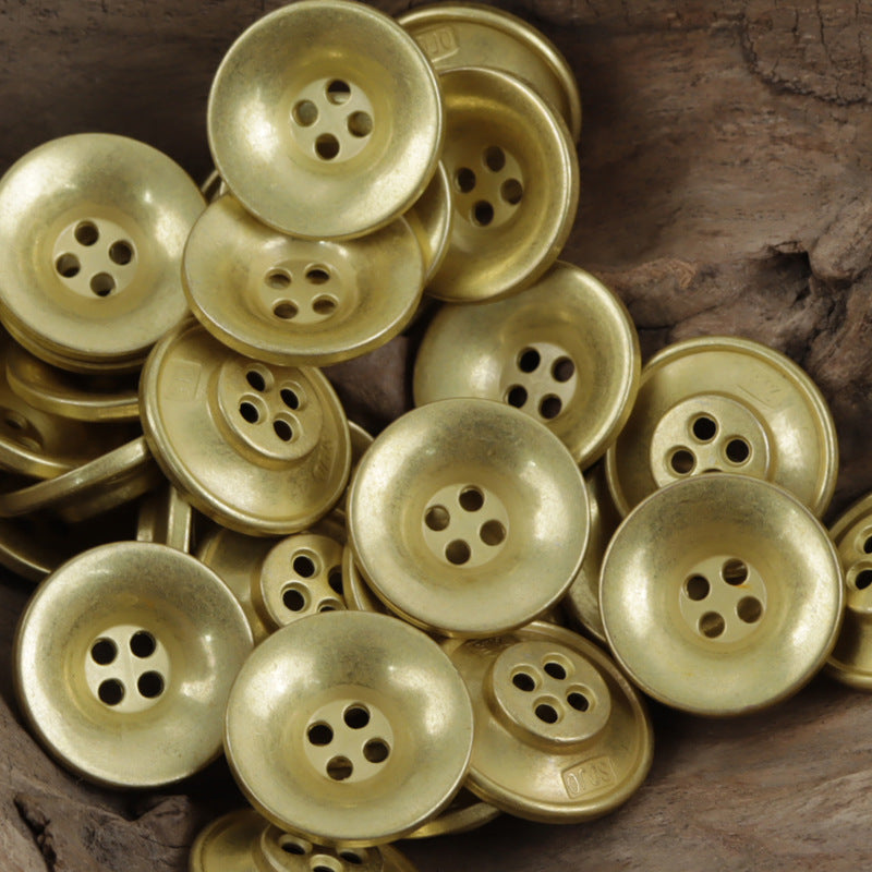 Bronze/gold bowl-shaped metal buttons, round convex profile, 4-hole centers