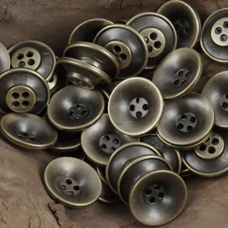 Mixed metal bowl-shaped coat buttons in bronze and silver tones, 4-hole fronts
