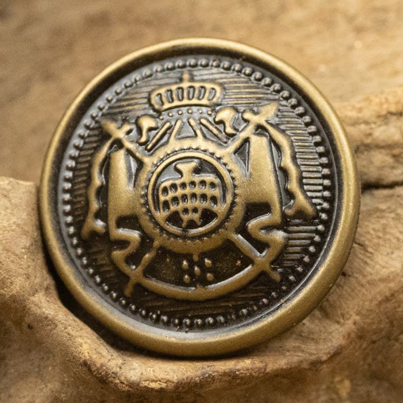 Round antique bronze brass button with crown medallion and star accents
