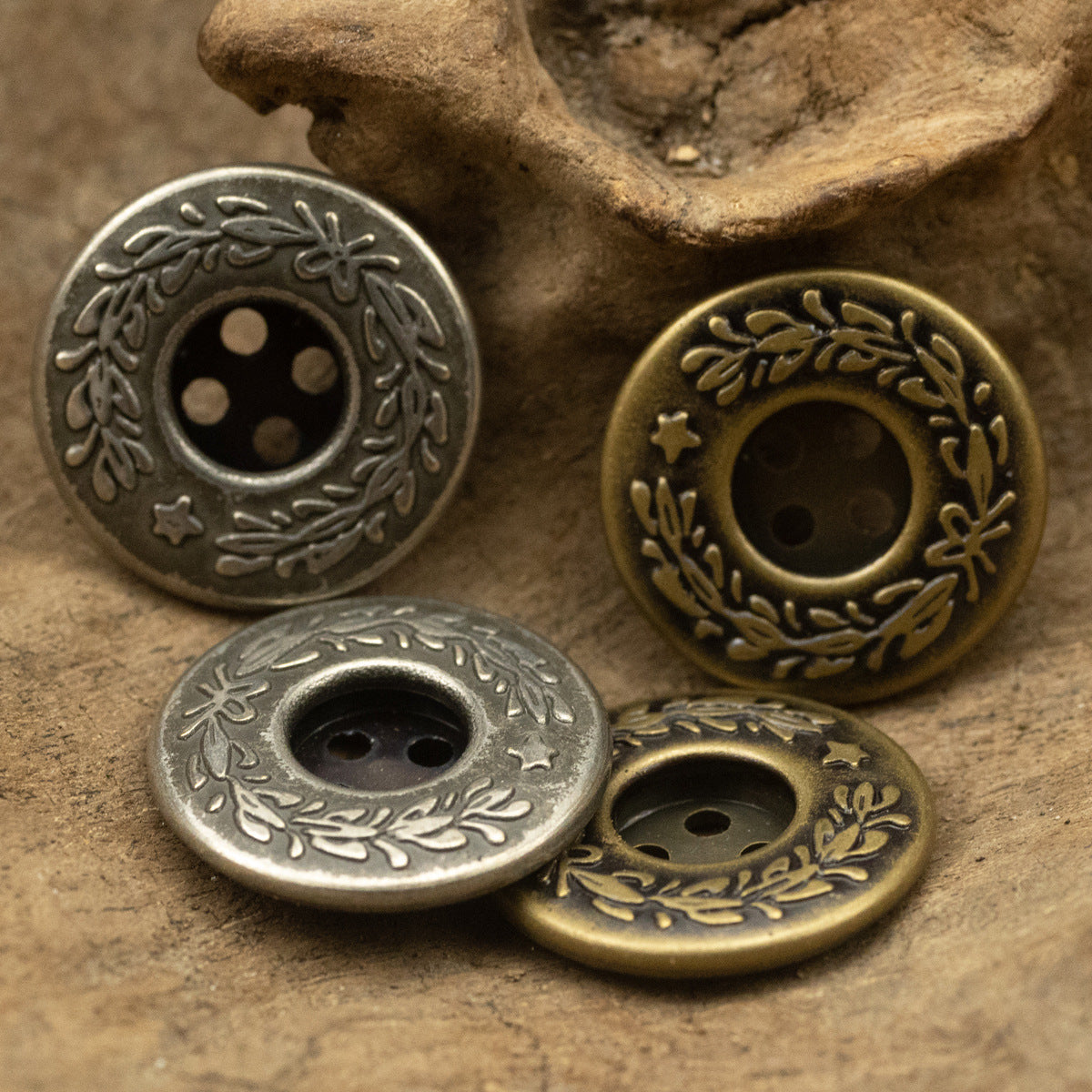 Set of laurel wreath metal buttons, 4-hole center, black nickel finish